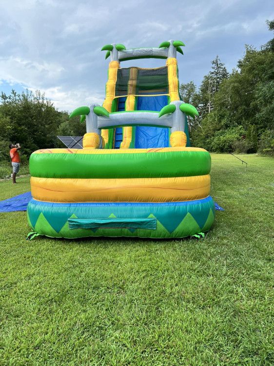 Tiki themed inflatable water slide
